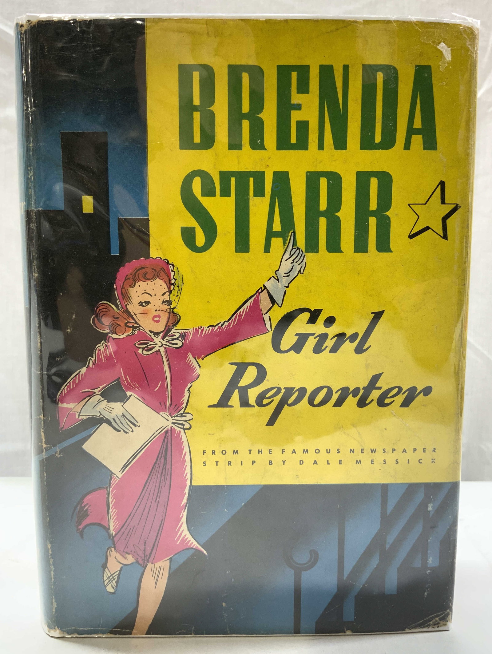 Brenda Starr Girl Reporter Book 1943 DALE MASSICK: Brenda Starr Girl Reporter Book 1943 DALE MASSICK Fictional book by Dale Masaick. Book was published in 1943. Front cover has illustrations of a woman wearing a pink dress. Signed & marked. Surface we