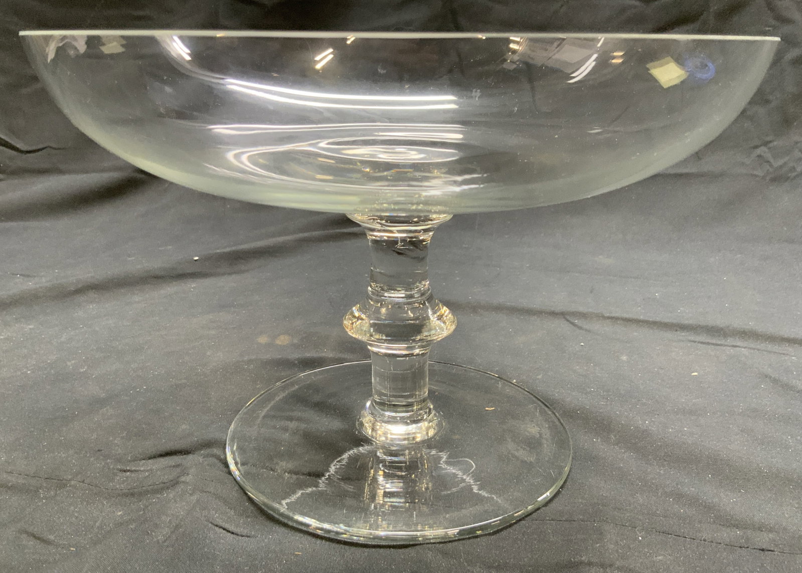 Vtg Crystal Pedestaled Bowl Vessel Centerpiece: Bowl is crystal. Appears to be Vintage. Vessel is pedestaled. Base of stem has circular form. Piece measures approximately 9.75 inches wide 6.5 inches tall. Centerpiece, bowl, vessel, pedestaled bowl,