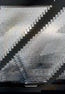 Vintage Silver Tone Cigarette Case: Vintage silver tone cigarette case. Raised basket weave pattern on cover. Hinged fold over and push secured cover. Measures approx 4 x 2.5 x .25 inches. Some wear including scratching observed. Silver