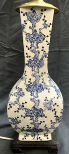 Vtg Hand Painted Asian Chinoiserie Porc Lamp: Lamp appears to be hand painted. Piece is white with blue toned floral, branch, and leaf detail. Lamp has black toned square form base with feet. Piece has gilt metal bulb socket. Lamp measures approx