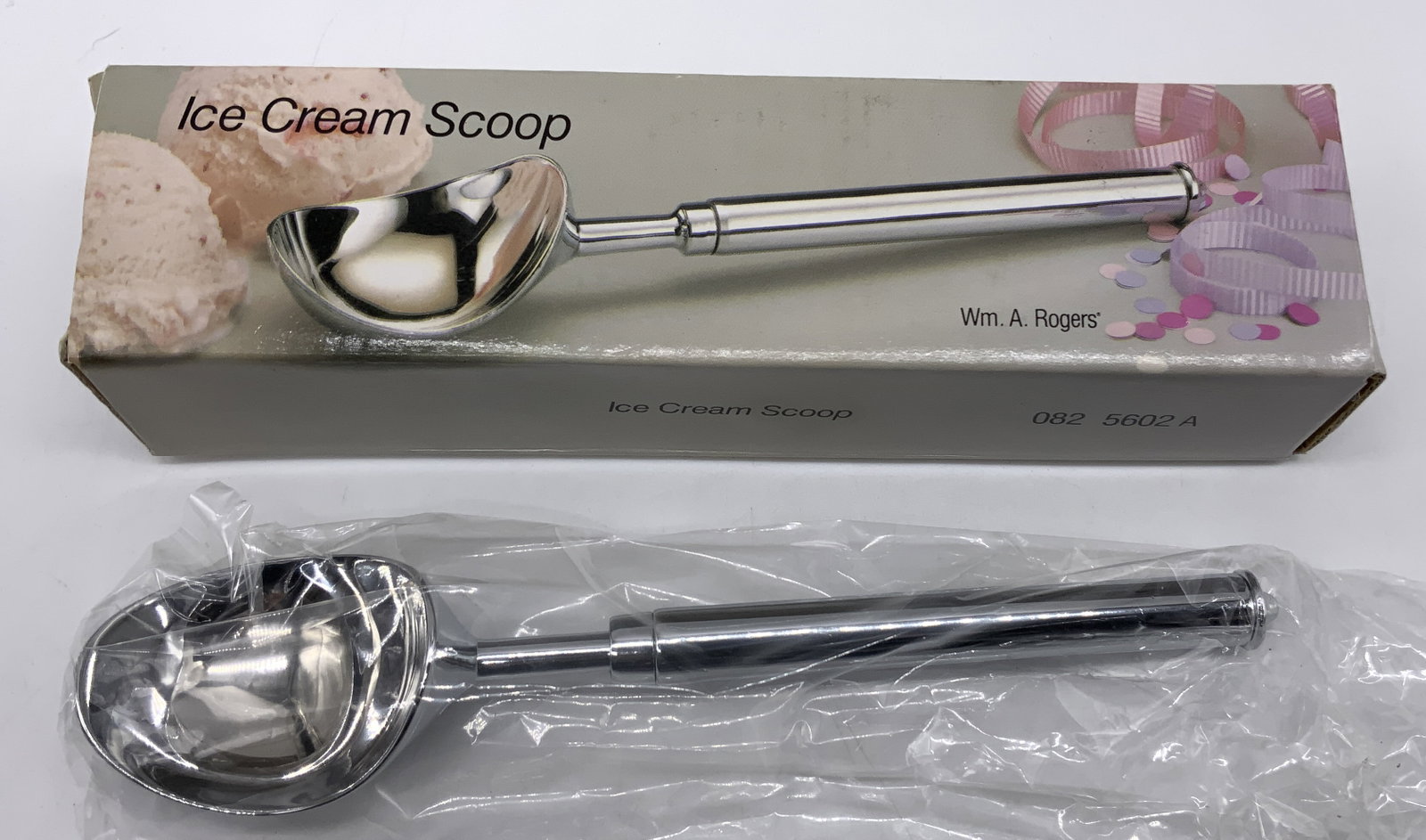 Wm. A. Rogers Chrome Plated Ice Cream Scooper NIB: Wm. A. Rogers Oneida Chrome Plated Ice Cream Scooper NIB Vntg ice cream scooper, scooper is chrome-plated & is BRAND NEW IN BOX. Signed & marked. Surface wear consistent to age, use & exposure. Measur
