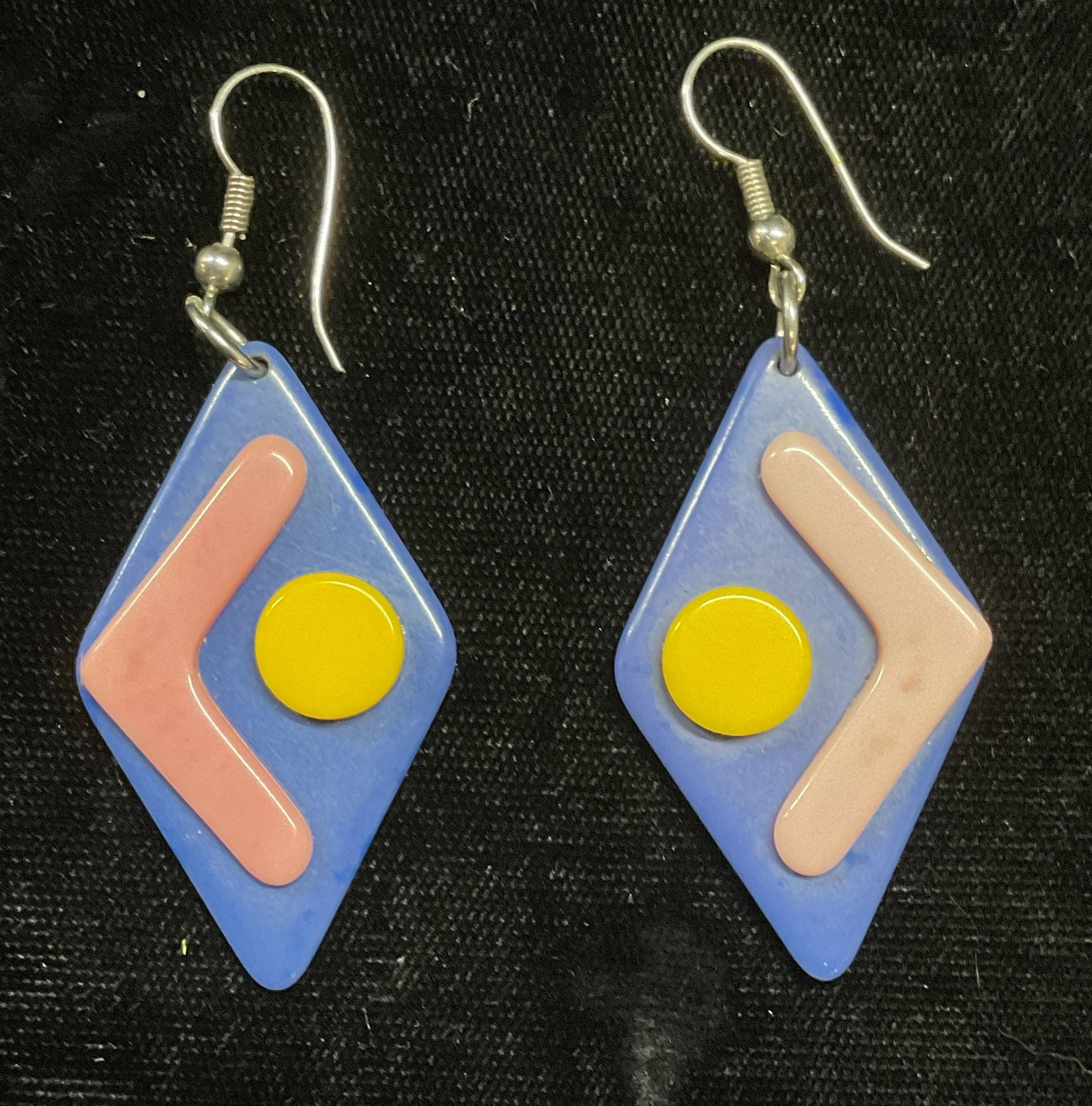 Vintage Purple Pink Geometric Earrings: Vintage geometric motif acrylic earrings in purple, pink, and yellow. Measure approx 1.75 x 1 inches. Some wear including scratching observed. Inventory from Manhattan Jewelry store circa 1950s-1960s.