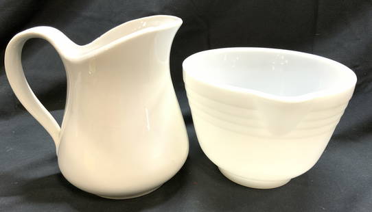 PYREX HAMILTON BEACH Bowl & Porc Pitcher: Lot includes 1 white toned glass bowl with spout trademarked PYREX HAMILTON BEACH on underside & 1 white toned porcelain pitcher. Pitcher has half heart form handle. Piece measures approximately 6.5 i