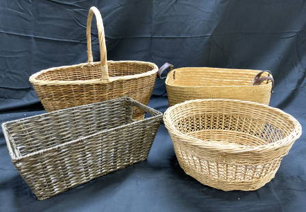 Lot 4 Assorted Woven Wicker Baskets: Lot includes 1 circular form basket, 1 basket with arch form handle, a brown toned basket with handles & 1 tan basket with leather handle. Each appear to be woven wicker. Largest basket measures appro