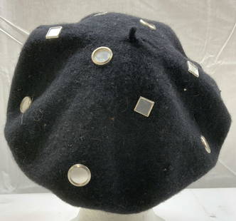 Black Beret Hat W Silver Embellishments HONG KONG: Black Beret Hat W Silver Embellishments HONG KONG Beret hat that is adorned with silver embellishments. Embellishments are round & square. Tag reads 100% wool & made in HONG KONG. Surface wear consist