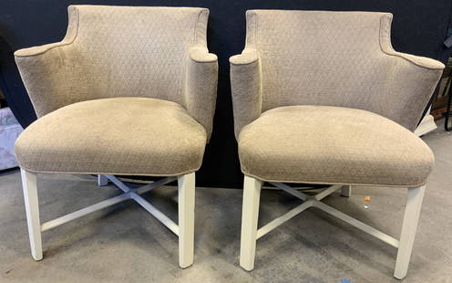 Pr Upholstered End Chairs W Wooden Legs: Lot includes 2 chairs. Each are upholstered with tan toned fabric. Chairs each have white toned wooden legs with X form stretchers in between. Chairs have armrests. Each piece measures approx 32 inche