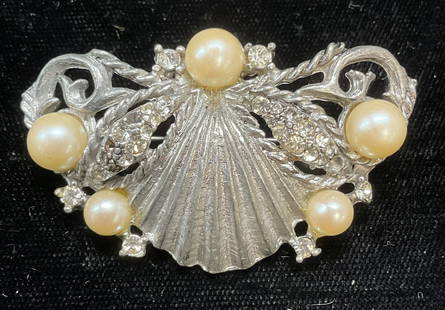 Vtg Silver Tone Crystal Faux Pearl Brooch: Vintage silver tone brooch with crystal and faux pearl decoration. Scroll motif. Measures approx 1.25 x 2 inches. Some crystal need replacement. Some wear including scratching observed. Inventory from