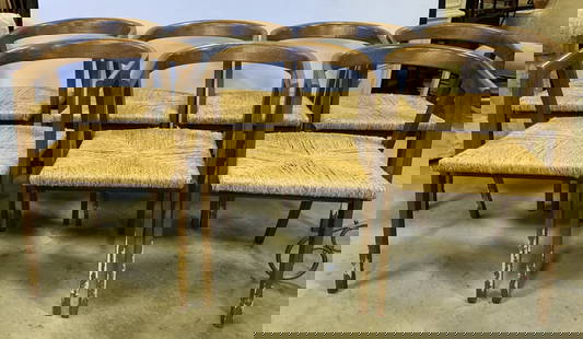 Set 7 Seagrass & Oak Horseshoe Dining Chairs: Lot includes 7 chairs. Each with seagrass seats and wooden frames which appear to be oak. Chairs each have horseshoe backrests. Each chair measures approximately 30 inches tall 20 inches wide and deep