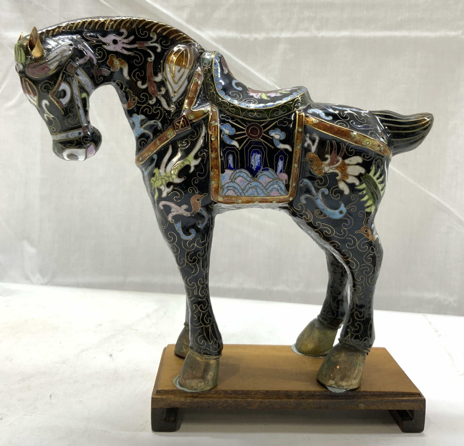 Chinese Cloisonne Style Horse Fig W Wooden Base: Chinese Cloisonne Style Horse Fig W Wooden Base Figurine depicting a horse that has various swirls & colors on body. Chinese cloisonne style, possible ceramic. Surface wear consistent to age, use & ex