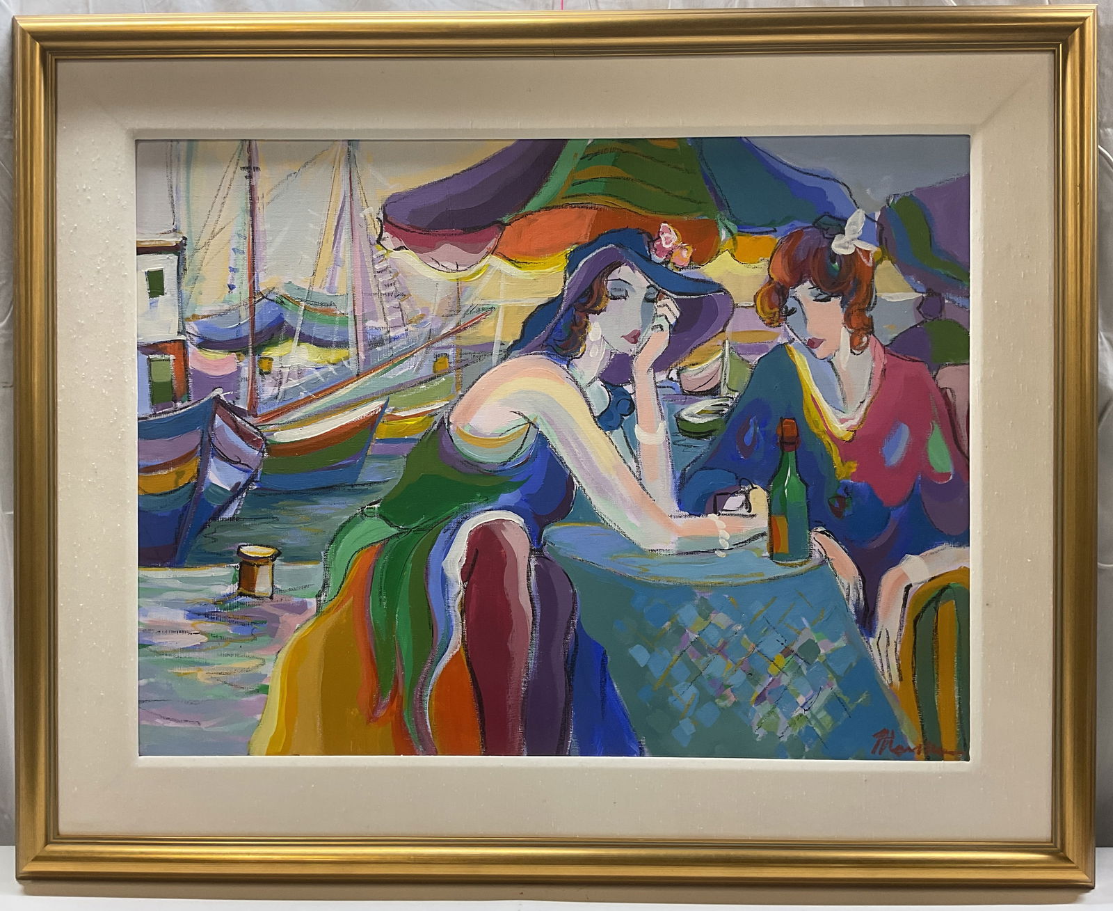 Isaac Maimon Two Women Embellished Serigraph: Framed serigraph on canvas by Isaac (Israeli, b. 1951). Appears to be hand embellished acrylic ink serigraph on canvas. Print signature at lower right. Exterior scene, two woman with bottle of wine an