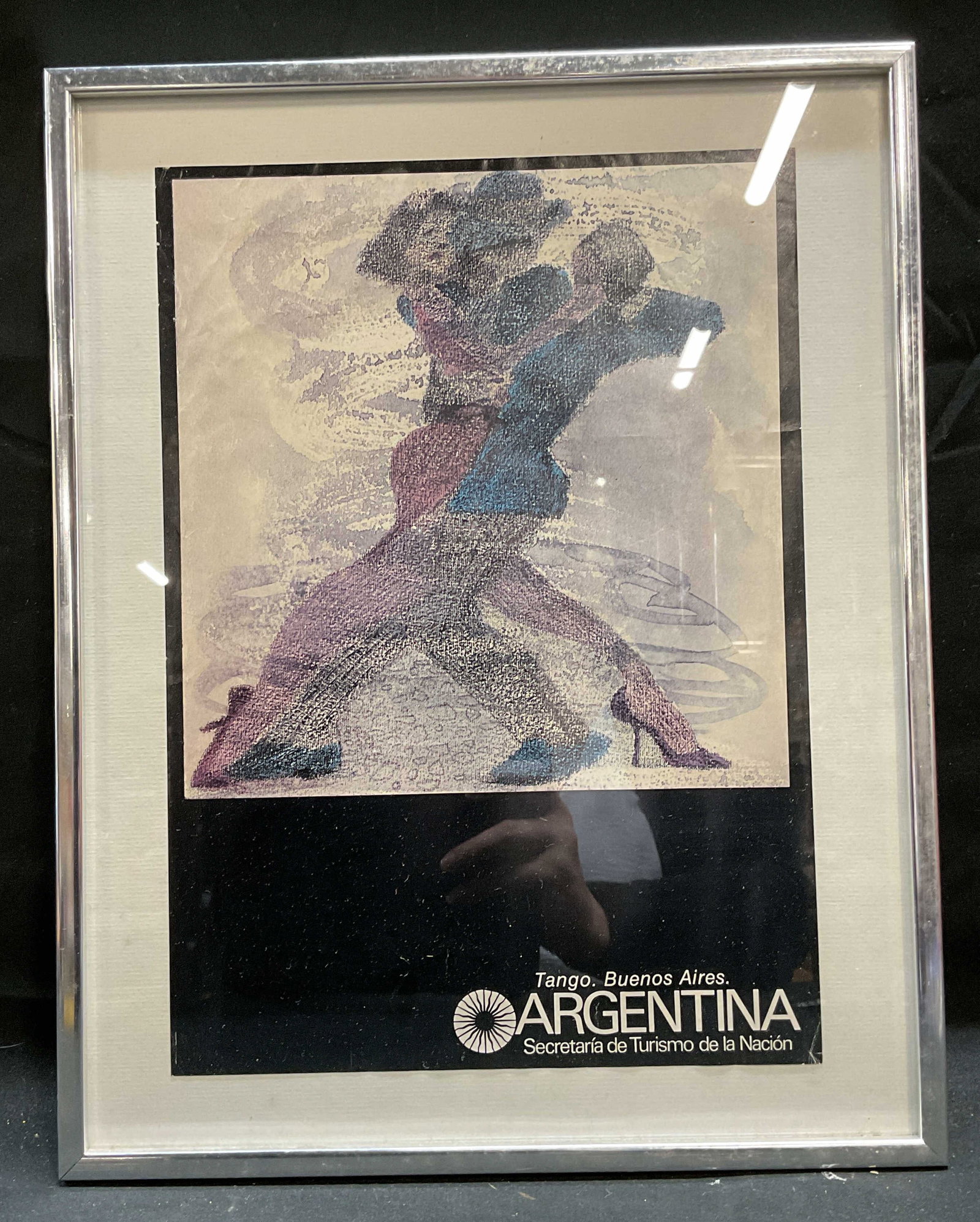 Framed Argentina Tourism Tango Advert Litho: Framed and matted advertising lithograph poster. Buenos Aires, Argentina tourism. Figures tango dancing. Silver tone metal frame. Not examined out of frame. Frame measures approx 14 x 11 inches. Some 