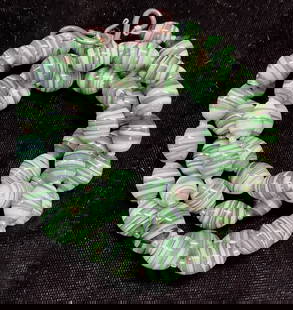 Vintage Green Art Glass Beaded Necklace: Vintage green swirl art glass beaded necklace. Drop length approx 13 inches. Some wear including scratching observed. Jewelry, estate jewelry, costume jewelry, fashion jewelry, cocktail jewelry, acces