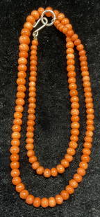 Vintage Red Coral Beaded Necklace: Vintage red coral beaded necklace. Graduated round coral beads drop length approx 10.5 inches. Some wear including scratching observed. Jewelry, estate jewelry, costume jewelry, fashion jewelry, cockt