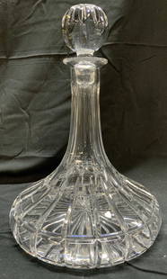 TOWLE Cut Crystal Ships Decanter W Stopper: Underside is marked TOWLE. Decanter is cut crystal. Piece includes spherical form stopper. Lower half of exterior is scalloped. Decanter measures approximately 11 inches tall 7.5 inches wide. Decanter