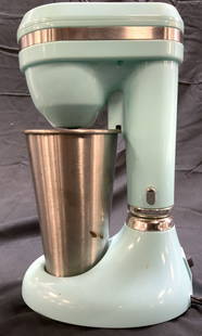 BRENTWOOD Classic Milkshake Maker: Milkshake maker is trademarked BRENTWOOD. Piece is light blue and silver toned. Piece includes brushed metal mixer cup. Milkshake maker has adjustable height. Piece measures approximately 10.25 inches