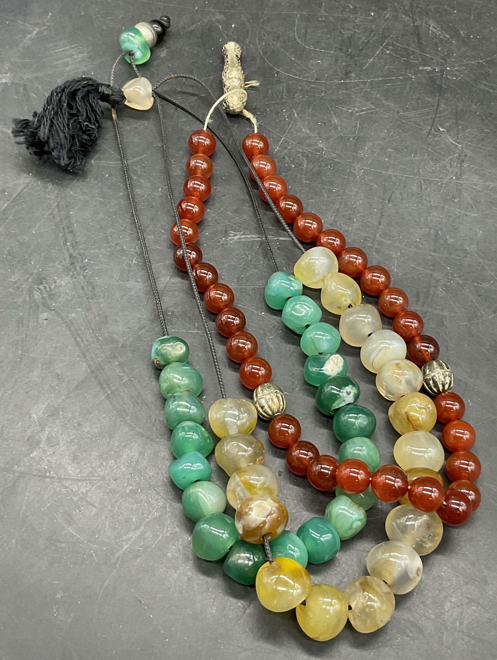 3 Natural Stone Prayer Beads / Jewelry Accessories: Three Natural Stone Prayer Bead Bracelets / Jewelry Accessories. One features green stones, another has red stones & silver tone metal beads, and the last has clear & yellow hued stones. All pieces ar