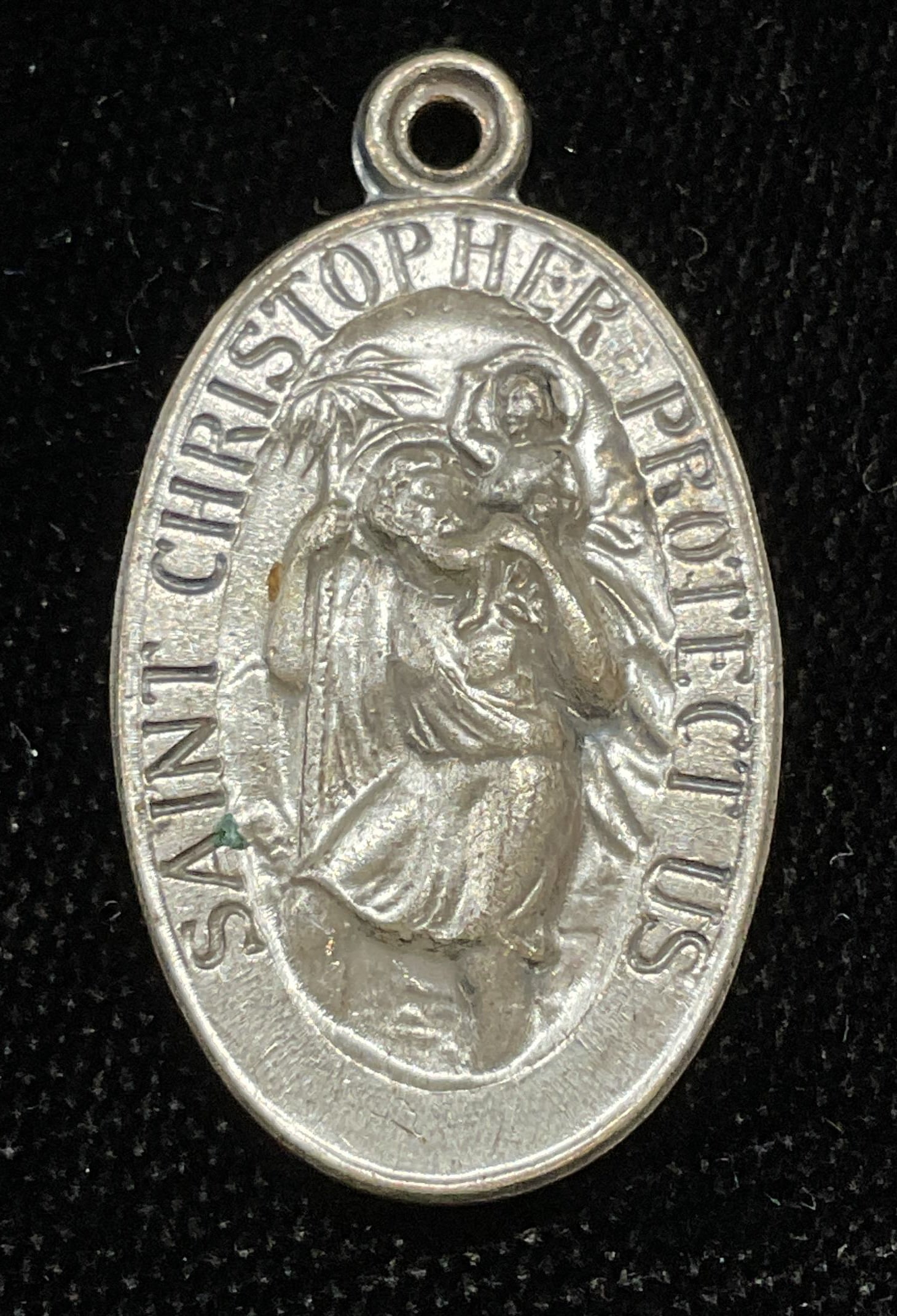 Vintage In Case of Accident Notify Priest Pendant: Vintage silver tone Saint Christopher pendant. Reads I am a Catholic in case of accident notify a priest on reverse. Measures approx 1 x 5/8 inches. Some wear including scratching observed. Jewelry, e
