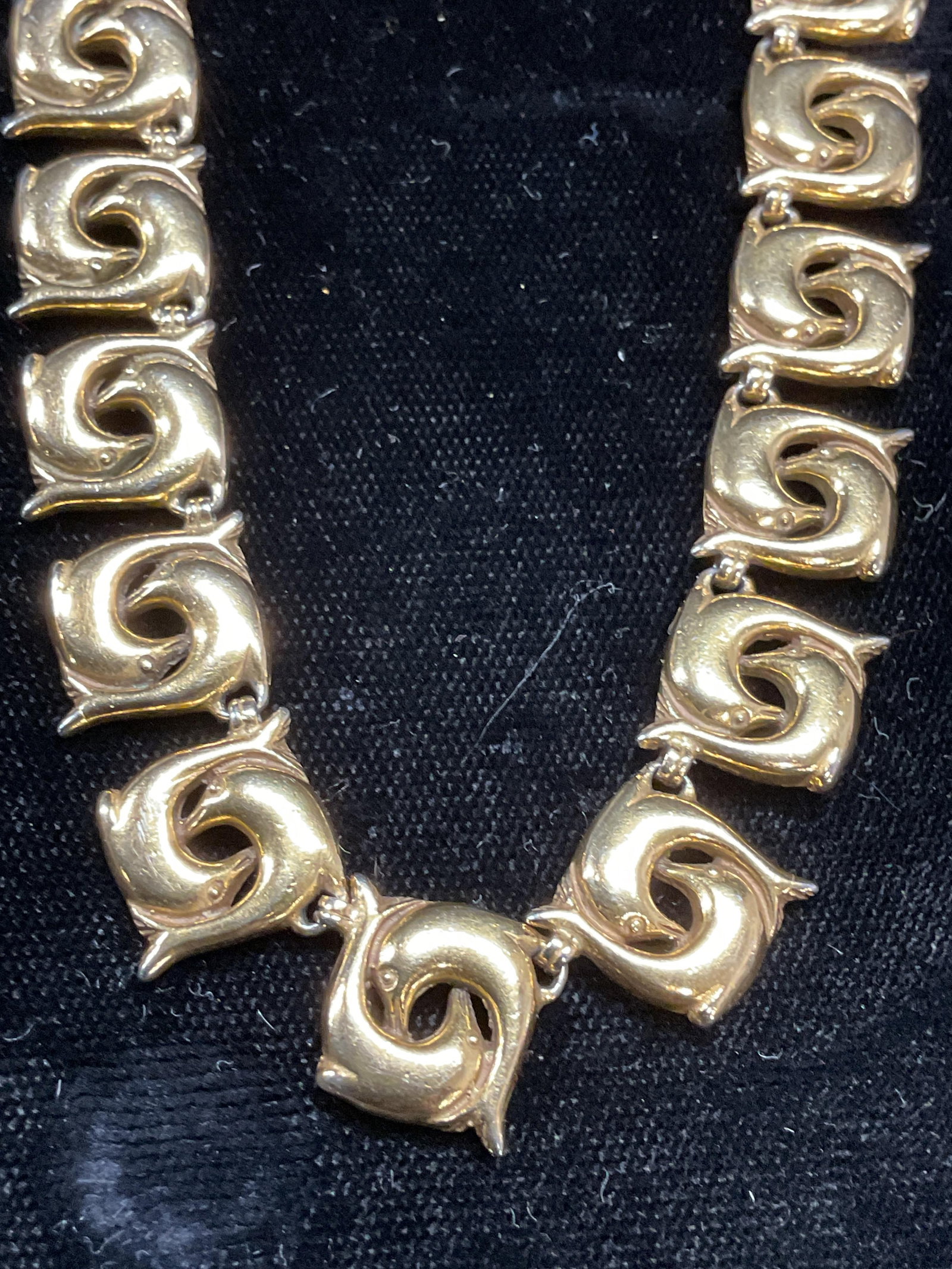 Vintage Gold Tone Dolphin Choker Necklace: Vintage gold tone dolphin motif panel choker necklace. Drop length approx 7 inches. Some wear including scratching observed. Jewelry, estate jewelry, costume jewelry, fashion jewelry, cocktail jewelry