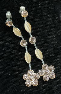 Silver Tone Pink Crystal Flower Earrings: Silver tone dangle earrings with pink crystal flower motif. Measure approx 2 inches long. Some wear including scratching observed. Jewelry, estate jewelry, costume jewelry, fashion jewelry, cocktail j