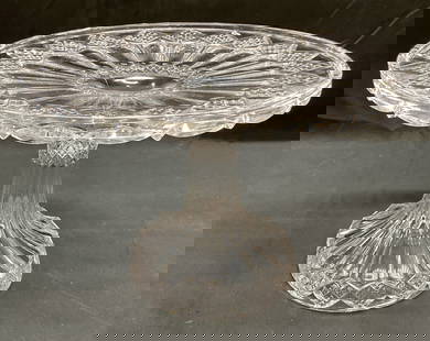 Clear Glass Diamond Pattern Cake Stand: Clear glass cake stand. Geometric diamond pattern. Measures approx 9.75 x 6.75 inches. Thick walled glass, piece has weight. Some wear including scratching observed. Cake stand, glass cake stand, tabl