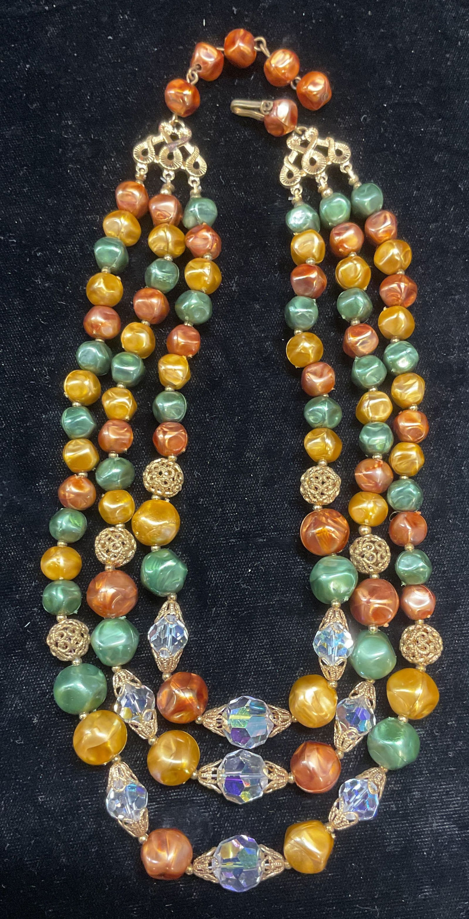 Vintage Faux Pearl & Crystal Beaded Necklace: Vintage three strand faux pearl and crystal beaded necklace with gold tone accents drop length approx 7 inches. Some wear including scratching observed. Jewelry, estate jewelry, costume jewelry, cockt