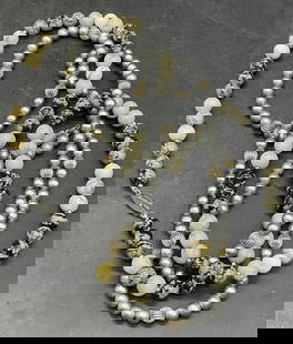 2 Vntg Natural Stone & Silver Tn Metal Necklaces: Lot of 2 Vintage Natural Stone & Silver Tone Metal Necklaces. Both beaded necklaces secure with clasp closures. The stone beaded necklace length measures approx. 25 inches. Losses to finish. Surface w