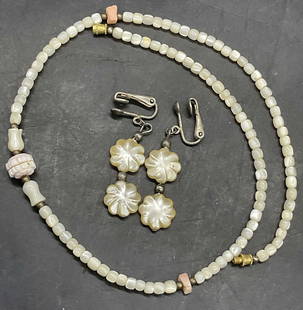 Vintage Pearlescent Beaded Necklace & Earrings: Vintage Pearlescent Beaded Choker Necklace & Earrings. The earrings are floral form and feature silver tone metal clip backings. The necklace features a twist clasp closure. Shell motif beads to the n