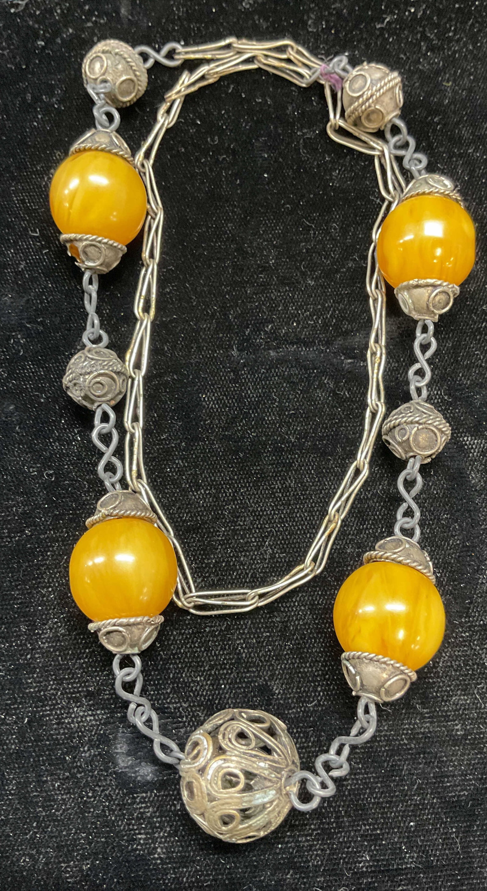 Vintage Silver Tone Faux Amber Necklace: Vintage silver tone necklace with faux amber beads. Drop length approx 12 inches. Some wear including scratching observed. Jewelry, estate jewelry, costume jewelry, cocktail jewelry, fashion jewelry, 