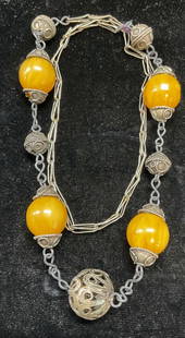 Vintage Silver Tone Faux Amber Necklace: Vintage silver tone necklace with faux amber beads. Drop length approx 12 inches. Some wear including scratching observed. Jewelry, estate jewelry, costume jewelry, cocktail jewelry, fashion jewelry,