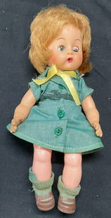 Vintage Articulated Baby Doll: Vintage articulated baby doll. Composite material. Measures approx 8 inches long. Wear to materials consistent with age and exposure. Doll, vintage doll, articulated doll, baby doll, toys, vintage toy