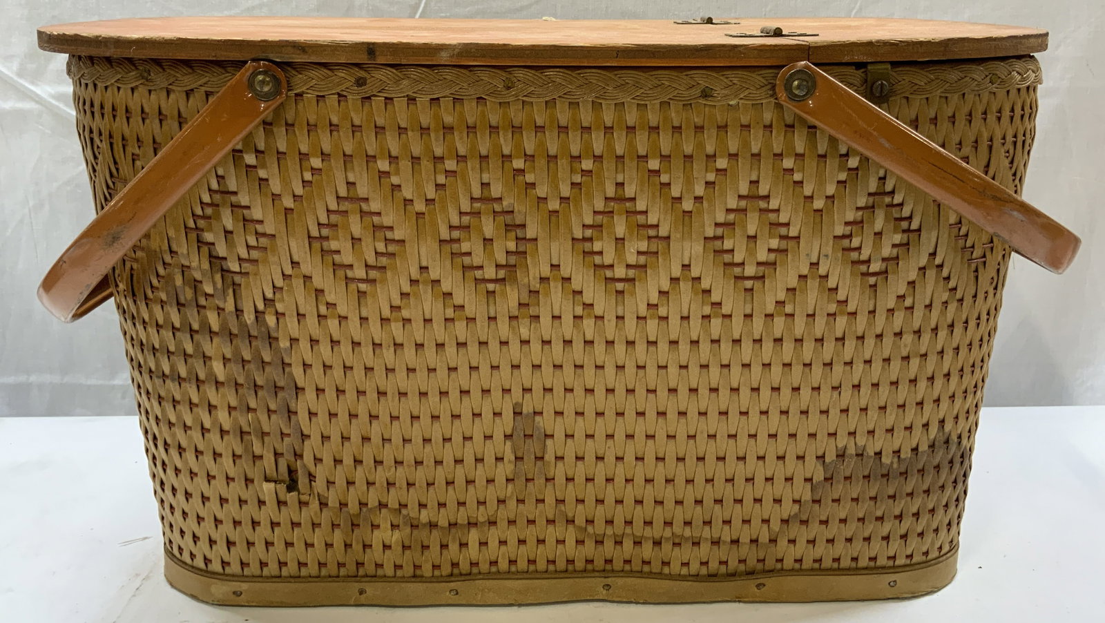 REDMON PERU IND. Wooden Rattan Picnic Basket: REDMON PERU IND. Wooden Rattan Picnic Basket Picnic basket from REDOND PERU IND. Basket is made out of wood & has a hinged wood top. Signed & marked. Surface wear consistent to age, use & exposure. Me