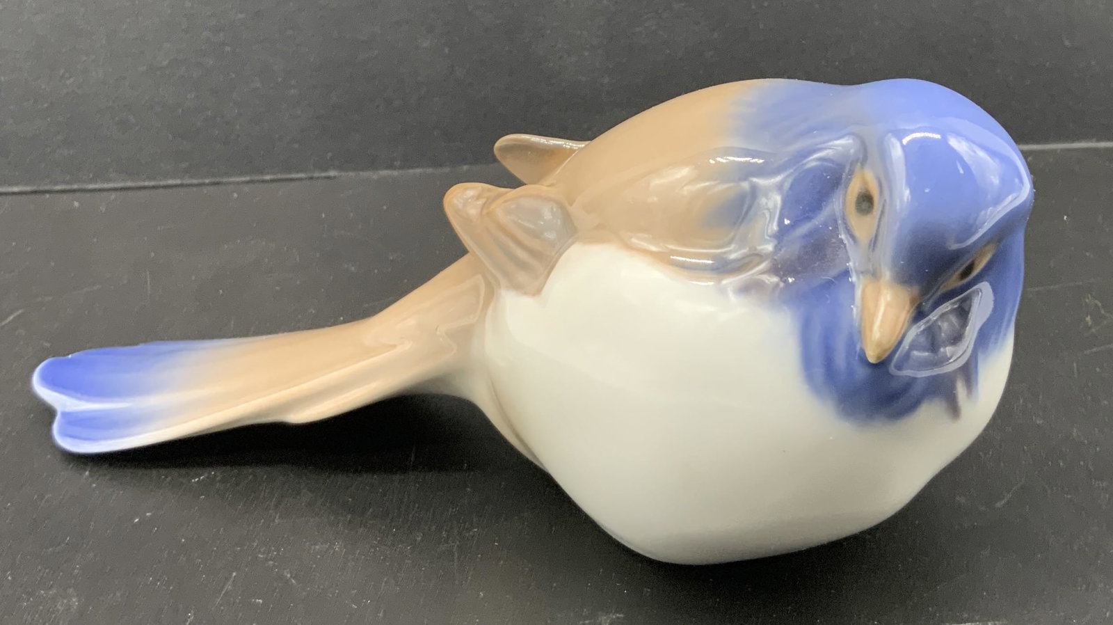 BING & GRONDAHL Titmouse Bird Porcelain Figural: BING & GRONDAHL Titmouse Bird Porcelain Figural Porcelain figural depicting a bird, bird has a blue head & a white chest. Signed & marked on underside. Surface wear consistent to age, use & exposure. 
