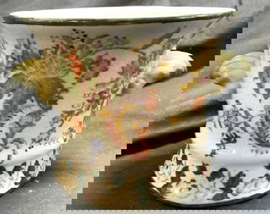 Signed Asian Porcelain Planter & Handles: Underside is signed with red toned chip signature with Asian characters. Piece is porcelain. Vessel has intricate multi toned floral motif detail. Planter has handles at sides. Measures approximately