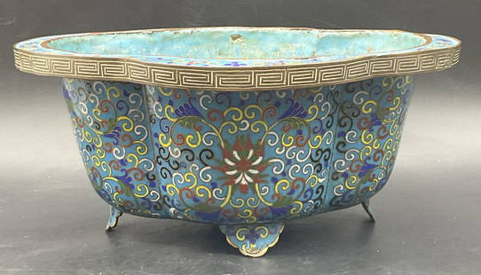 Antique Asian Enamel Quatrefoil Planter Vessel: Antique, possibly vintage, Asian Enamel Quatrefoil Planter Vessel. Primarily blue with accents of yellow, red, green, and white throughout. Measures approx. 4.25H x 10W in. Drilled hole to