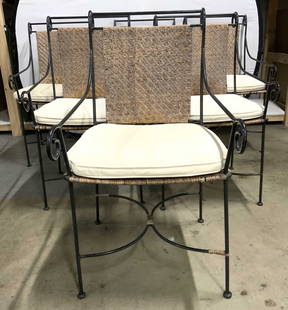 Set 6 Wrought Iron & Caned Dining Chairs: Lot includes 6 dining chairs. Each have wrought iron frames. Chairs each have tan toned caned seats and backrest areas. Each include cream toned cushions. Chairs each Measures approx 37 inches tall 20