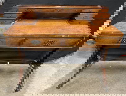 BAKER FURNITURE Vintage Regency Style Writing Desk: Baker Furniture Vintage Regency Style Writing Desk. Leather inlay to the top features tooled leather details. Ten drawers of various sizes to the obverse. Metal hardware to the drawers. Metal caps to