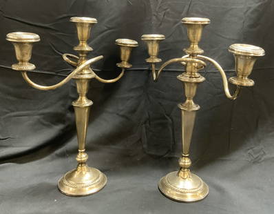 Pr Sterling Silver 3 Arm Candelabras: Undersides are inscribed STERLING WEIGHTED. Lot includes 2 candelabras. Each have 3 arms. Candelabras have circular form bases. Candelabras are convertible. Candelabras each measure approximately 14.5
