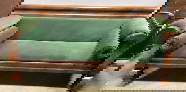 Vtg Uph Empire Wooden Box Sofa On Casters: Sofa is vintage & wooden. Piece has green toned Upholstery. Empire sofa sits on gilt metal casters. Lot includes 2 cylindrical bolster pillows. Sofa has carved wooden feet. Measures approximately 76 i