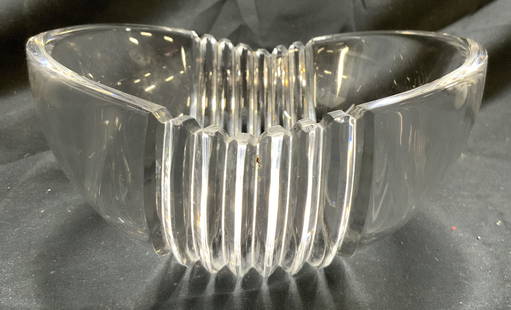 TIFFANY & CO Signed Fluted Crystal Bowl: Bowl is signed TIFFANY & CO. Piece is crystal. Bowl has fluted area. Two areas on rim are toothed. Bowl measures approximately 6.25 inches wide 3.25 inches tall. Bowl, crystal bowl, Tiffany & co bowl,