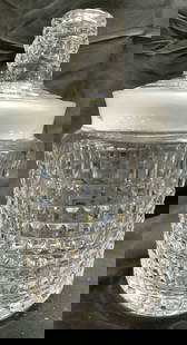 WATERFORD Cut Crystal Jar Vessel W Lid: Base is trademarked WATERFORD. Jar is cut crystal. Piece includes lid. Jar has square relief pattern detail. Rim interior is frosted. Lid handle has relief detail. Piece measures approximately 8.25 in