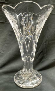 WATERFORD Crystal Leenane Vase Vessel: Vase is signed WATERFORD. Vase model LEENANE. Vessel is cut crystal. Piece is footed. Vase has floral form& has relief detail. Vessel measures approximately 10 inches tall 6.25 inches wide. Vase, crys