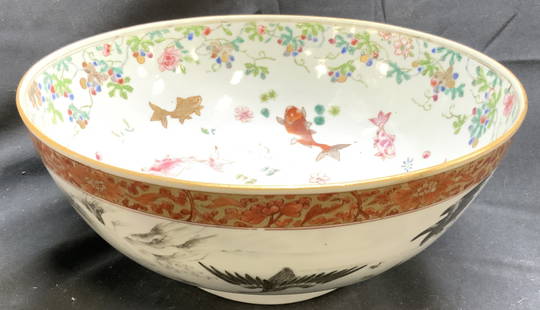 Vntg Famille Rose Hand Painted Asian Porc Bowl: Bowl is hand painted with multi toned floral, leaf, koi fish, & crane detail. Vessel has gilt rim. Famille Rose Chinese export bowl. Piece is vintage, crafted with porcelain. Bowl measures approximate