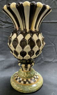 MACKENZIE CHILDS Ceramic Thistle Vase: Vase appears to be Mackenzie Childs (no apparent inscriptions). Vase is hand painted with multi toned checkered, stripe, and floral petal pattern detail. Top half of vase is scalloped. Vessel measures