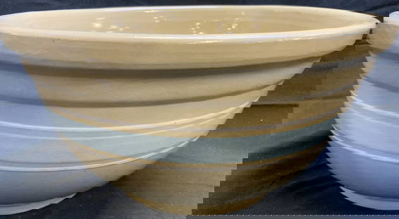GOLD N BAKE OVENWARE XL Ceramic Cntrpce Mixing Bwl: Underside is inscribed GOLD N BAKE OVENWARE. Bowl is ceramic. Piece appears to be vintage. Bowl is tan with light blue and white stripe detail. Outer rim has lip. Bowl is XL in size measuring approxim