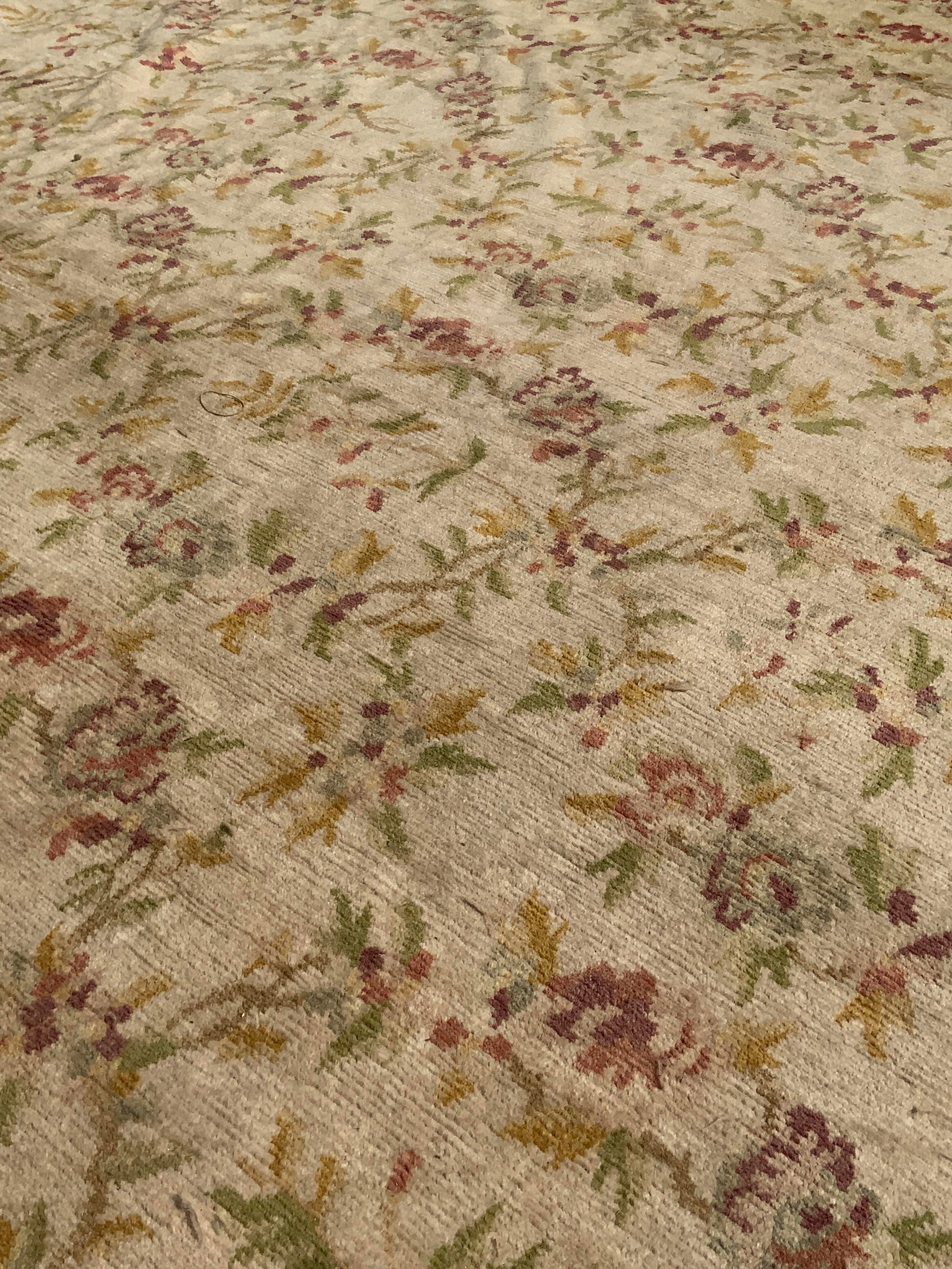 Vintage Oversize Floral Wool Carpet: Carpet has intricate multi toned floral motif detail. Rug has beige base tone. Piece appears to be wool, possibly handmade. Rug is oversized measuring approximately 252 inches long 196 inches wide. Ru