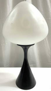LAUREL LAMP CO Acorn Form Table Lamp: Lamp appears to be LAUREL LAMP CO (no apparent markings). Lamp has white toned acorn form shade. Piece has black toned metal base. Table lamp measures approximately 18.25 inches tall 8.5 inches wide.