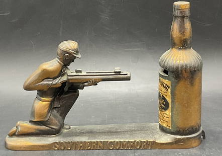 SOUTHERN COMFORT Vintage Mechanical Metal Bank: SOUTHERN COMFORT Vintage Mechanical Metal Bank. Subject is a man holding a weapon. He aims it at a bottle of Southern Comfort. Measures approx. 6H x 8.25W in. Discoloration, surface wear, residue, and