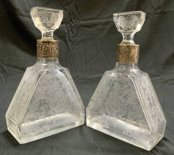 Sterling Silv Collar Art Gls Decanters GERMANY: Decanter collars are inscribed STERLING GERMANY. Lot includes 2 decanters. Each have sterling silver collar/rim with floral, leaf & scroll detail. Decanters each have frosted floral, scroll, leaf viol