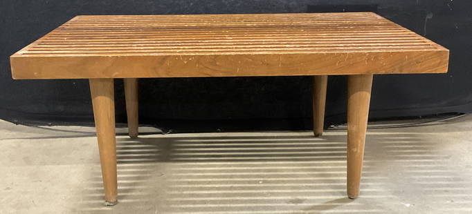 Vtg Mid Century Modern Slat Bench / Coffee Table: Vintage Mid Century Modern Slat Bench / Coffee Table. Rectangular form. Tapered legs. Measures approx. 28W x 18D x 11.75H in. Wobble to piece, legs need adjustment. Discoloration, losses to finish, ch
