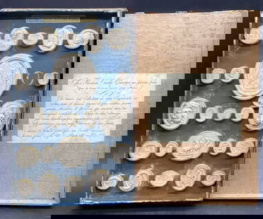 THOMAS CADES PLASTER INTAGLIO RELIEFS, Box: THOMAS CADES PLASTER INTAGLIO RELIEFS. Interior above the plasters reads MANIERA GRECA SECONDA EPOCA. Paper to the lid is in a foreign language. Possibly reads THOMAS CADES. Box measures approx. 2H x